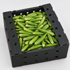 Overhead detail of whole green okra pods in a black ventilated produce box